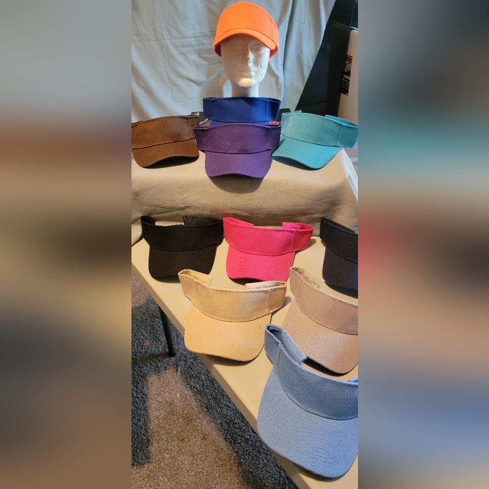 New adjustable Sun Visors 100% polyester assorted colors each sold separately